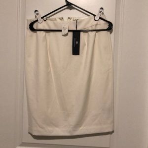 Cream knee length skirt